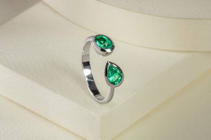 Anillo abierto oro blanco con esmeraldas naturales - ANB013