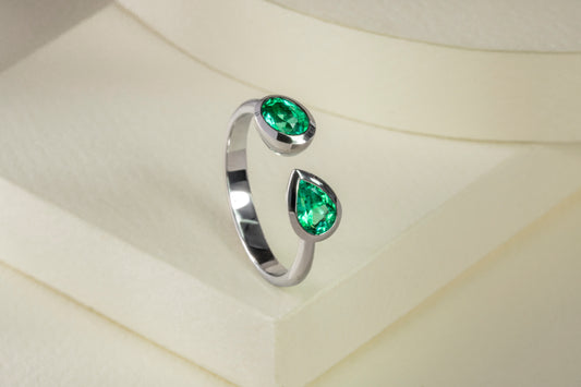 Anillo abierto oro blanco con esmeraldas naturales - ANB013