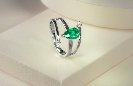 Anillo oro blanco con esmeralda y diamantes naturales - ANB056