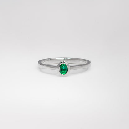 Anillo solitario oro blanco con esmeralda natural - ANB071