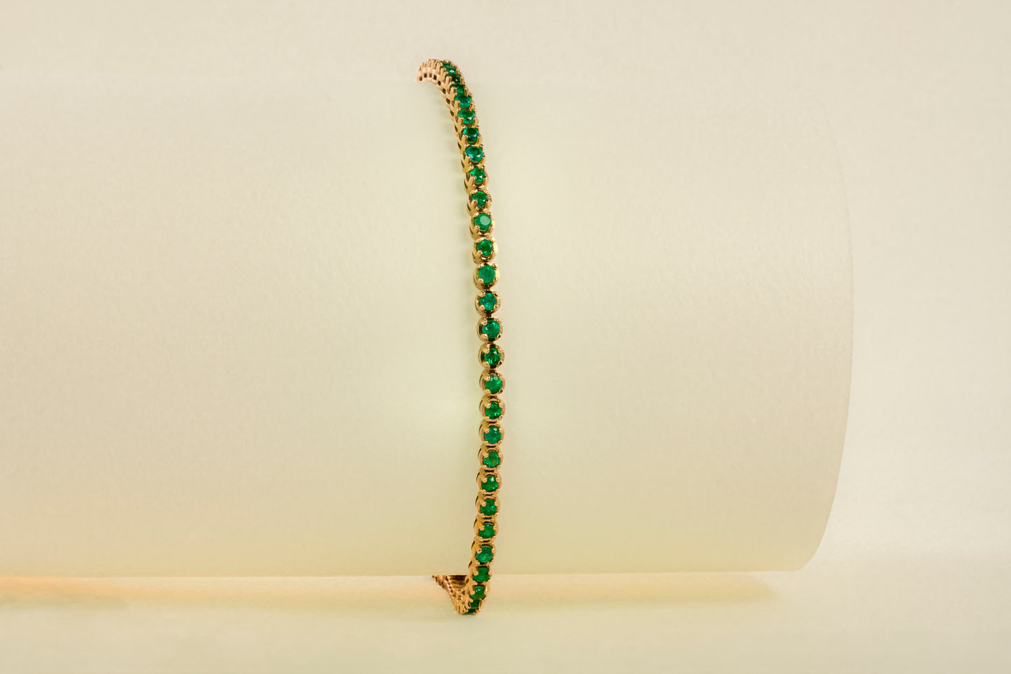 Endless yellow gold with natural emerald - BRA007