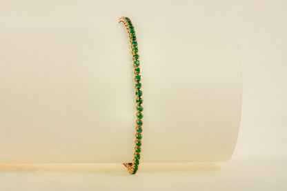 Endless yellow gold with natural emerald - BRA007