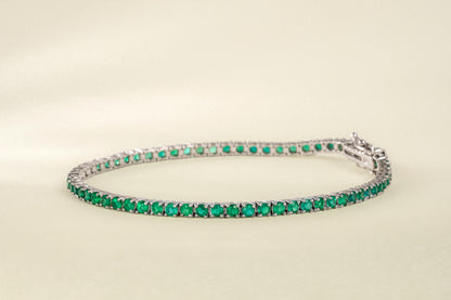 Endless white gold with natural emerald - BRA008