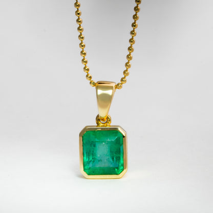 Dije oro amarillo con esmeralda natural - DOA160