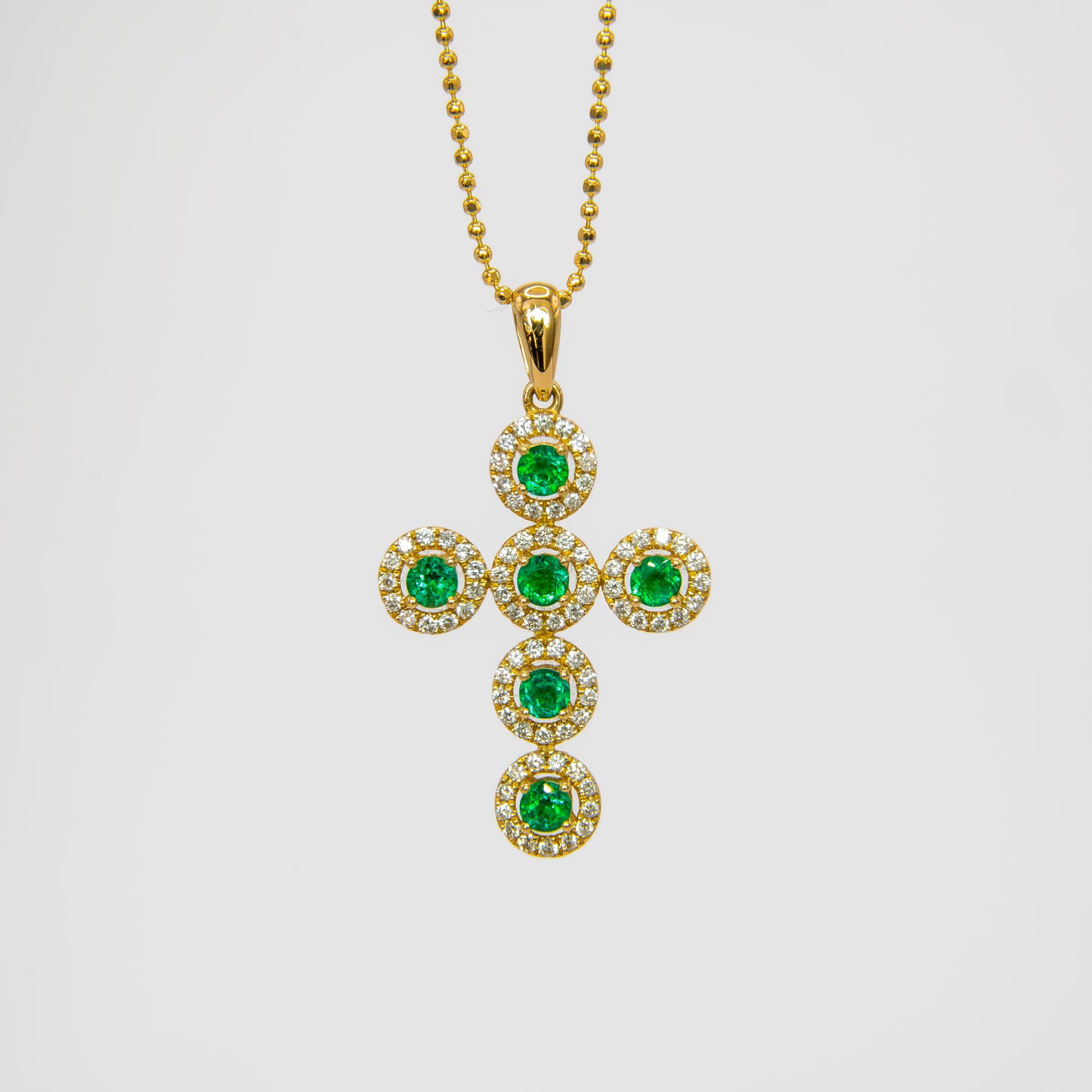 Dije oro amarillo con esmeraldas y diamantes naturales - DOA168