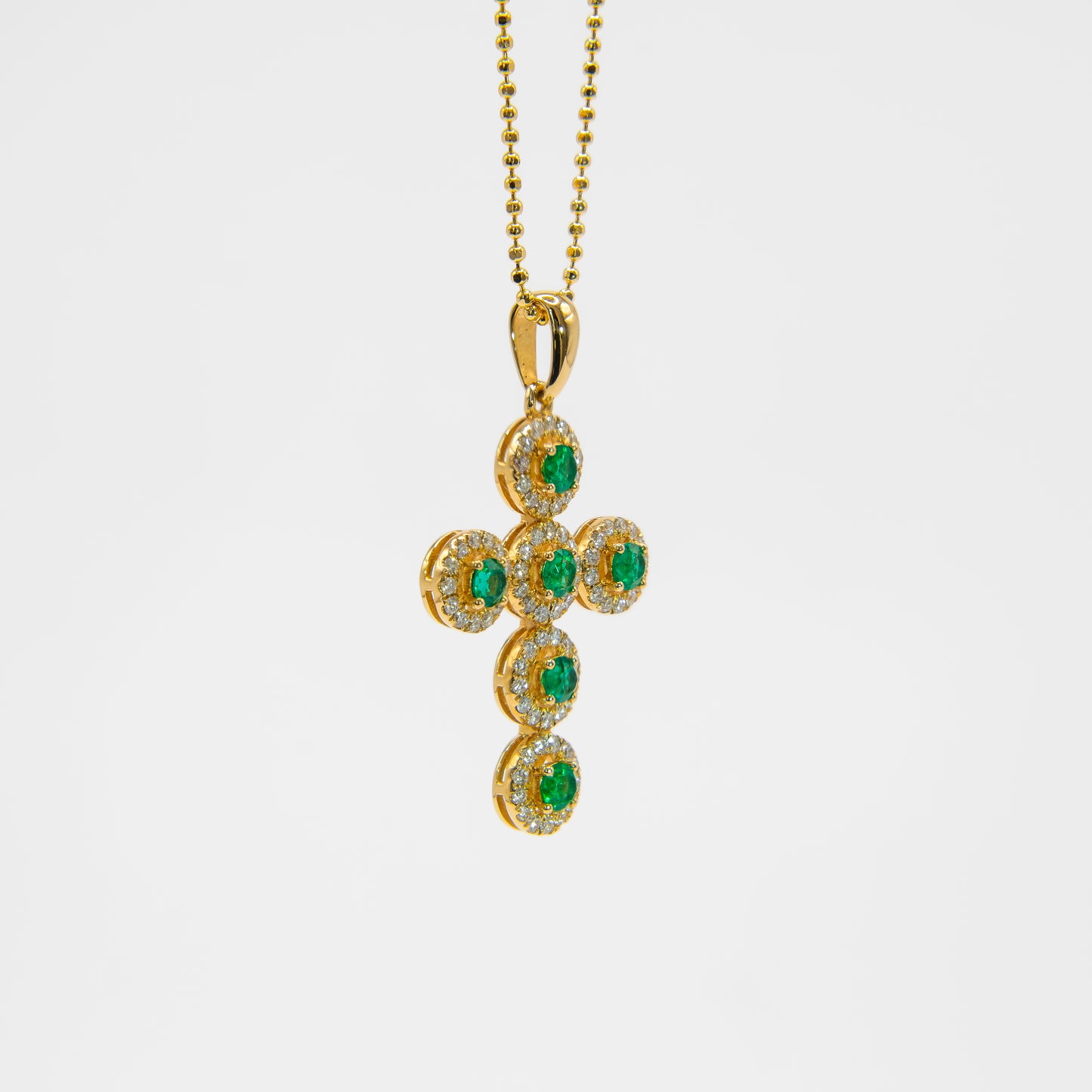 Dije oro amarillo con esmeraldas y diamantes naturales - DOA168