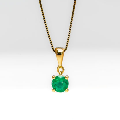 Dije oro amarillo con esmeralda natural - DOA183