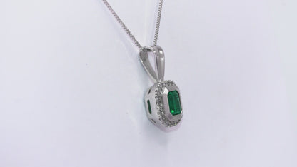 Dije oro blanco con esmeralda y diamantes naturales - DOB058