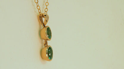 Dije oro amarillo con esmeralda natural - DOA093