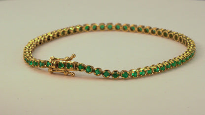 Endless yellow gold with natural emerald - BRA007